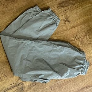 Windbreaker material sweats. Also reflective